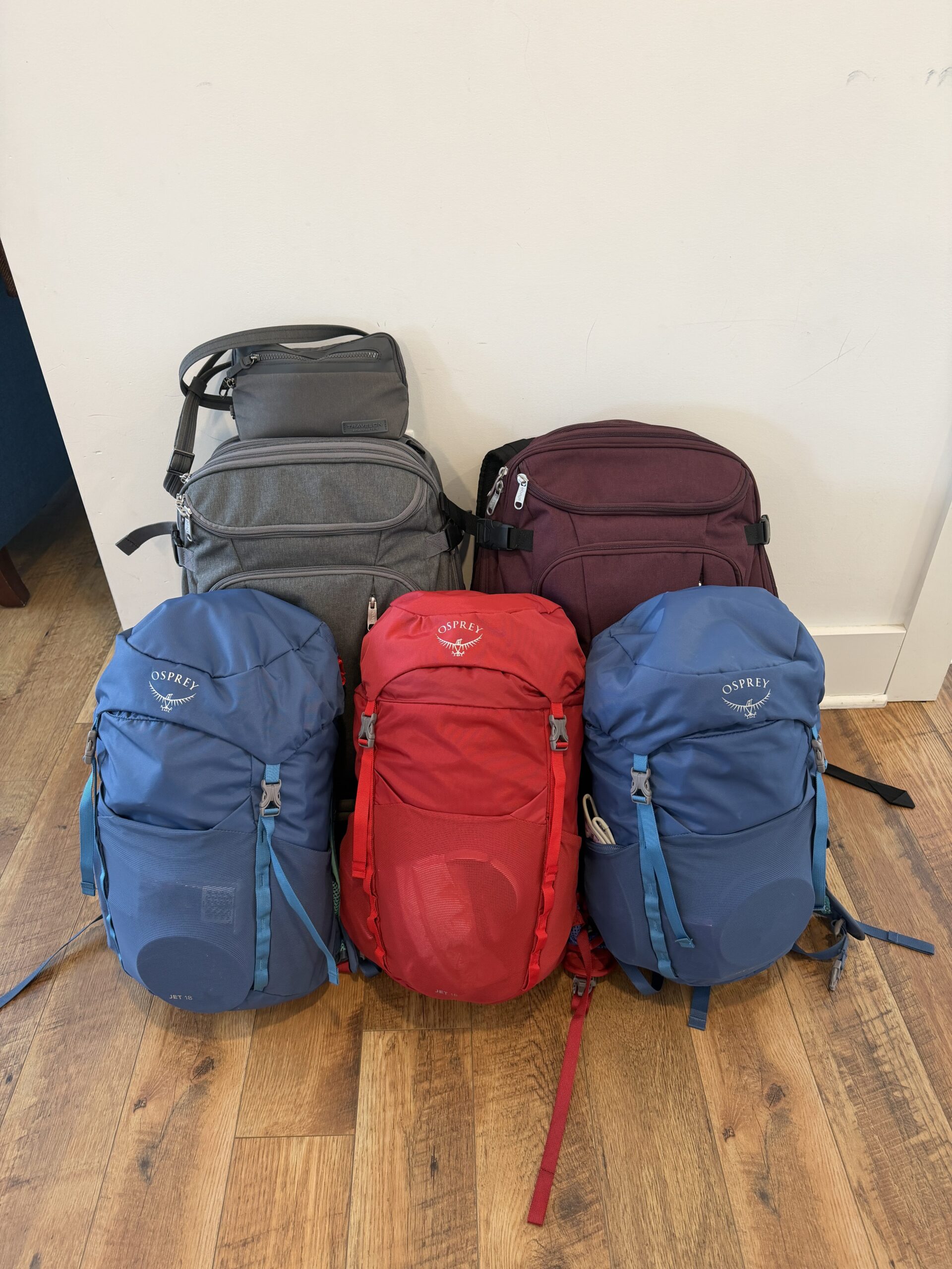 family of 5 carry-on only luggage and backpacks