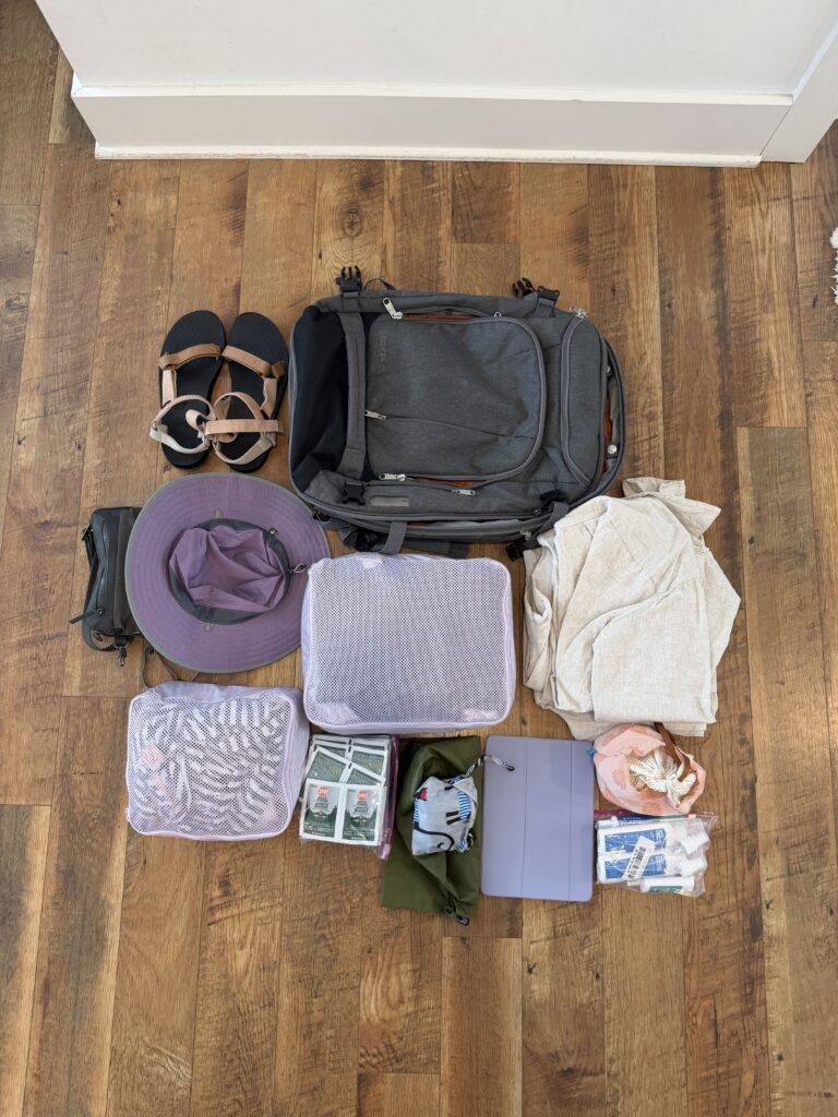 Women packing carry-on only supplies